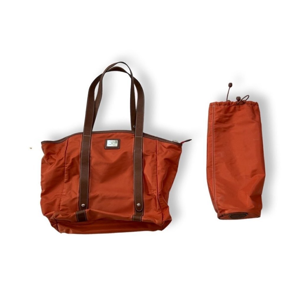 Lancel orange nylon travel bag/purse